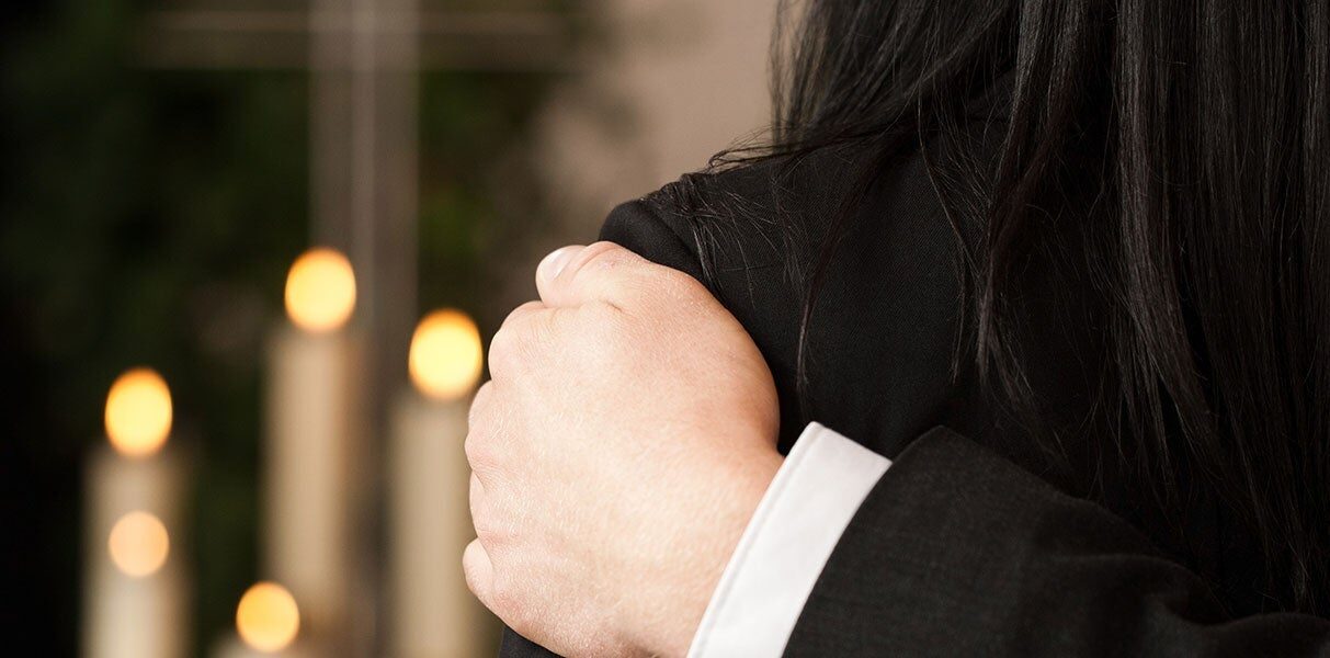 close-up of a suit and candles